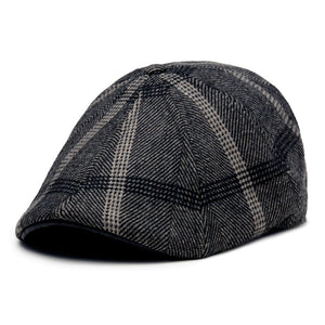 Side view of black and gray plaid eight-panel flat cap
