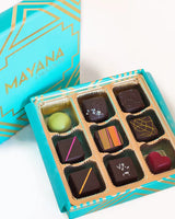 Mayana 9-piece artisan chocolate box with assorted hand-decorated bonbons in teal and gold packaging