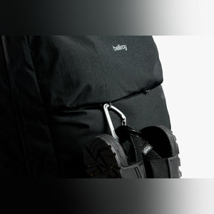 Bellroy Lite Travel Pack 38L carry-on backpack in Black, close-up of detail and strap - The Simple Man