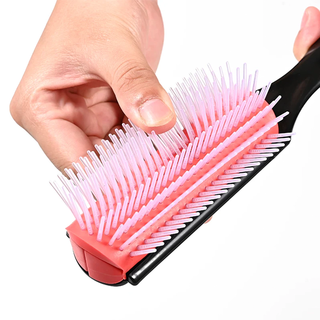 Close-up of Pete and Pedro 9-row hair brush flexible nylon bristles on cushioned pad – men's detangling and styling brush