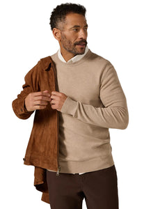 Man wearing tan Alcott Crewneck Sweater by The Simple Man, styled with a brown suede jacket and dark pants