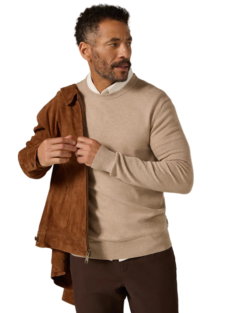 Man wearing tan Alcott Crewneck Sweater by The Simple Man, styled with a brown suede jacket and dark pants