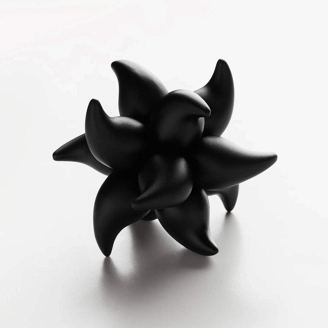 Craighill Andromeda Puzzle held in hand showing scale and dense aluminum construction