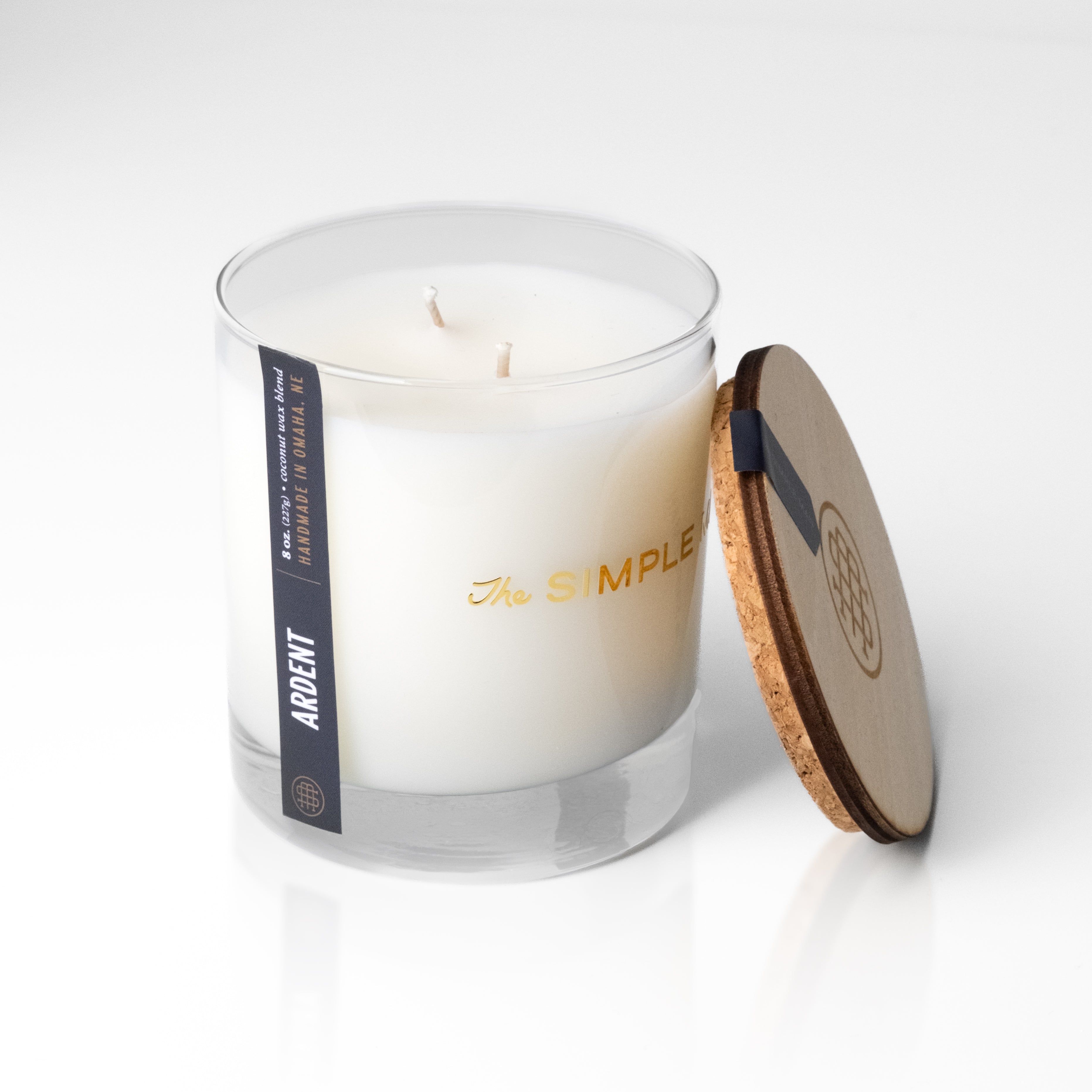 The Simple Man Ardent 8oz coconut wax candle with double wick and wood cork lid removed, handmade in Omaha – The Simple Man
