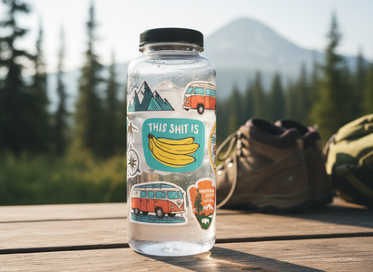 Bottle with a colorful label featuring a van and bananas on a wooden surface with a natural background.