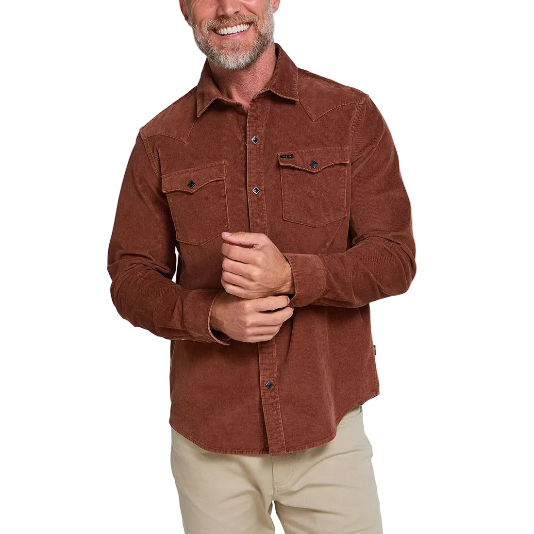 Man smiling wearing the Mink Brown Banning Corduroy Snapshirt, diamond pearl snap buttons on rust brown corduroy western shirt, front view -- The Simple Man