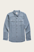 Flat lay of the Bedford organic cotton button-up workshirt in denim herringbone.