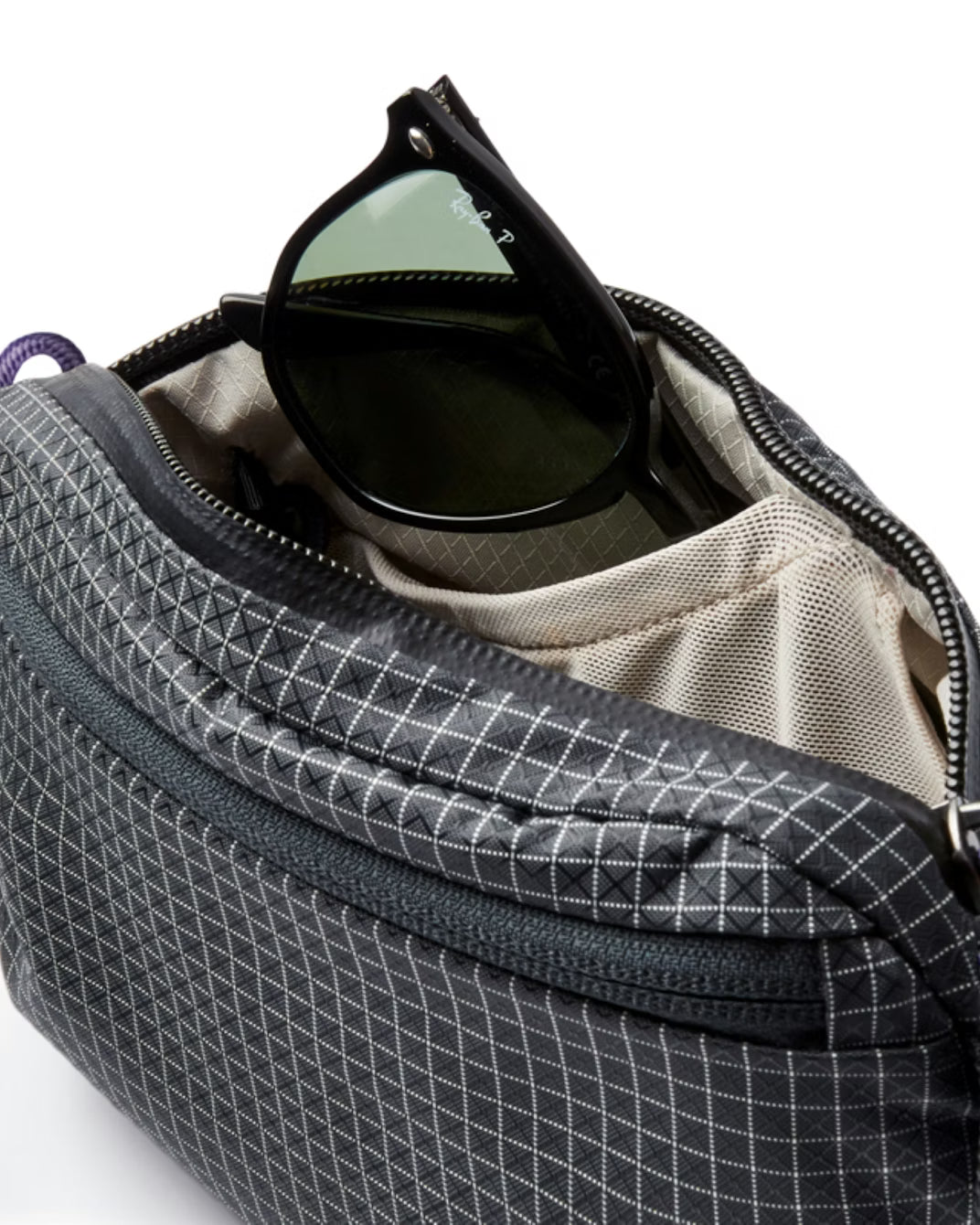 ellroy Lite Belt Bag Arcade Grey packed flat to show lightweight travel-friendly design