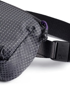 Magnetic strap clasp on the Bellroy Lite Belt Bag in Arcade Grey