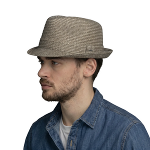 Bailey Billy Trilby Hat Natural – side profile on model wearing men's woven paper polyester summer fedora with short snap brim
