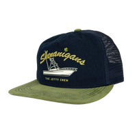 Navy trucker hat with olive green bill and embroidered Shenanigans boat graphic, Boat Crew Hat front angled view - The Simple Man