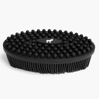Black dual-sided silicone body scrub brush, three-quarter view