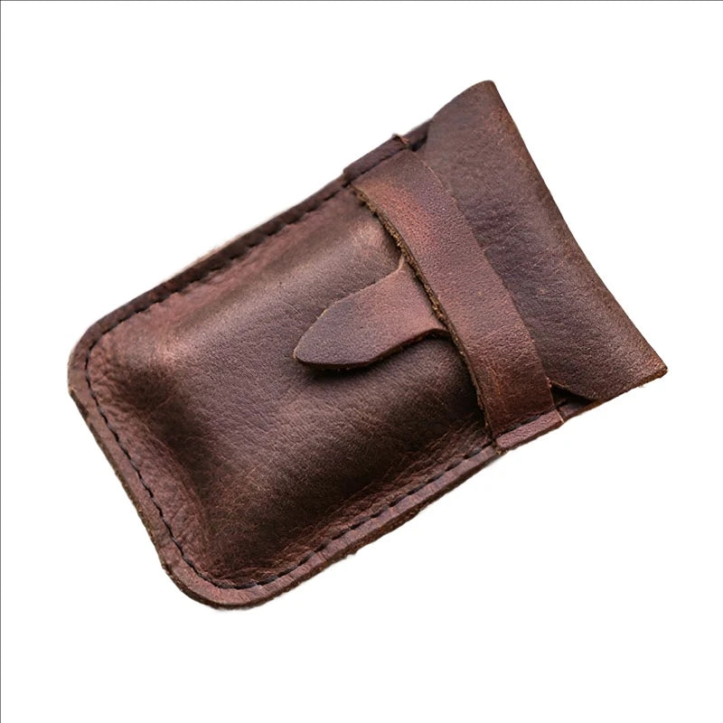 Hardmill's 6 machined brass dice in brown leather pouch, shown with pouch closed