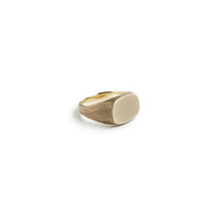 Solid brass signet ring with brushed oval face and visible maker’s tool marks – Studebaker Metals at The Simple Man