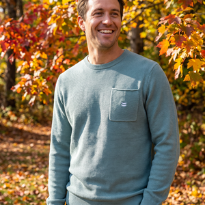 Man wearing light grey waffle knit pocket sweater outdoors in fall, Brine Sweater lifestyle shot - The Simple Man