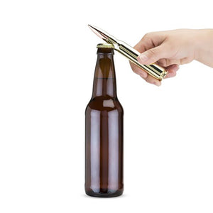 Bullet bottle opener without packaging, opening a bottle