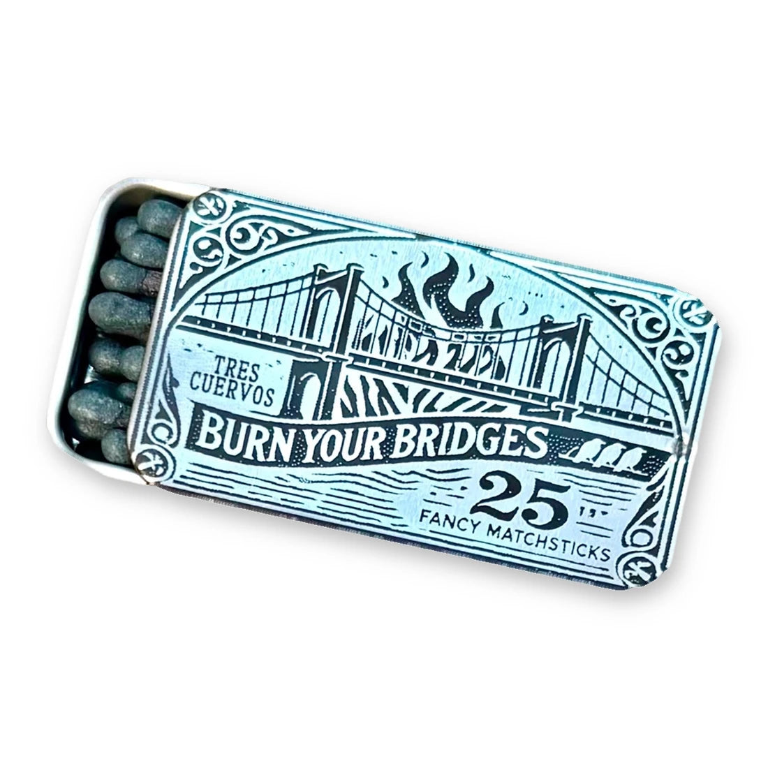 Metal matchbox with a burning bridge illustration and Burn Your Bridges on the lid, open to show dark-tipped matches