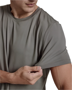 Model wearing 7 Diamonds Core crew-neck t-shirt in steel gray, close up detail view