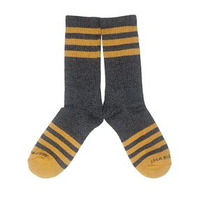 Charcoal heathered cotton blend sock with gold woven stripes, flat lay