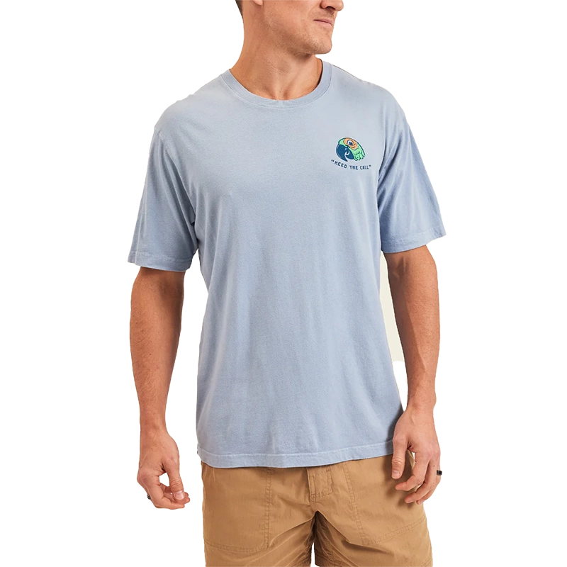Model Wearing Howler Brothers Chatty Bird Cotton T-shirt, in dusty blue, front view