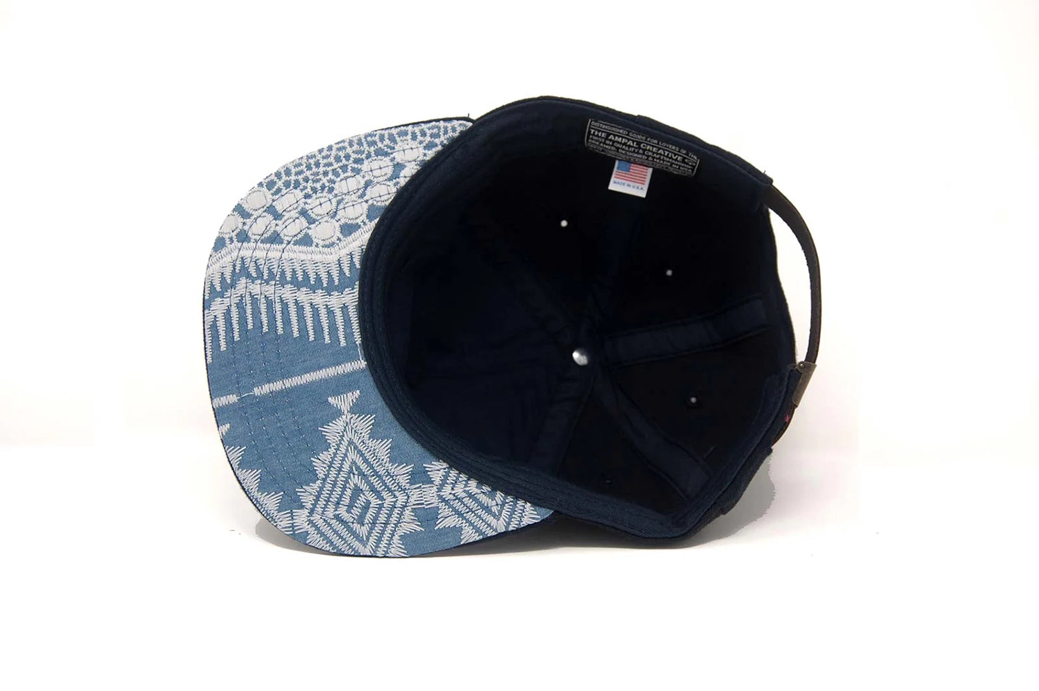 Inside view of the Chimayo Wool Strapback Hat showing the blue Southwest woven underbrim and USA-made label.