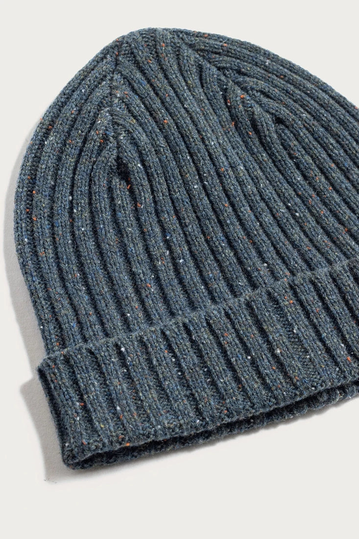 Chunky ribbed merino wool beanie in seaside blue — close-up view showing textured knit detail from The Simple Man