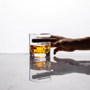 Corkcicle Cigar Glass - Whiskey tumbler  side view with model's hand