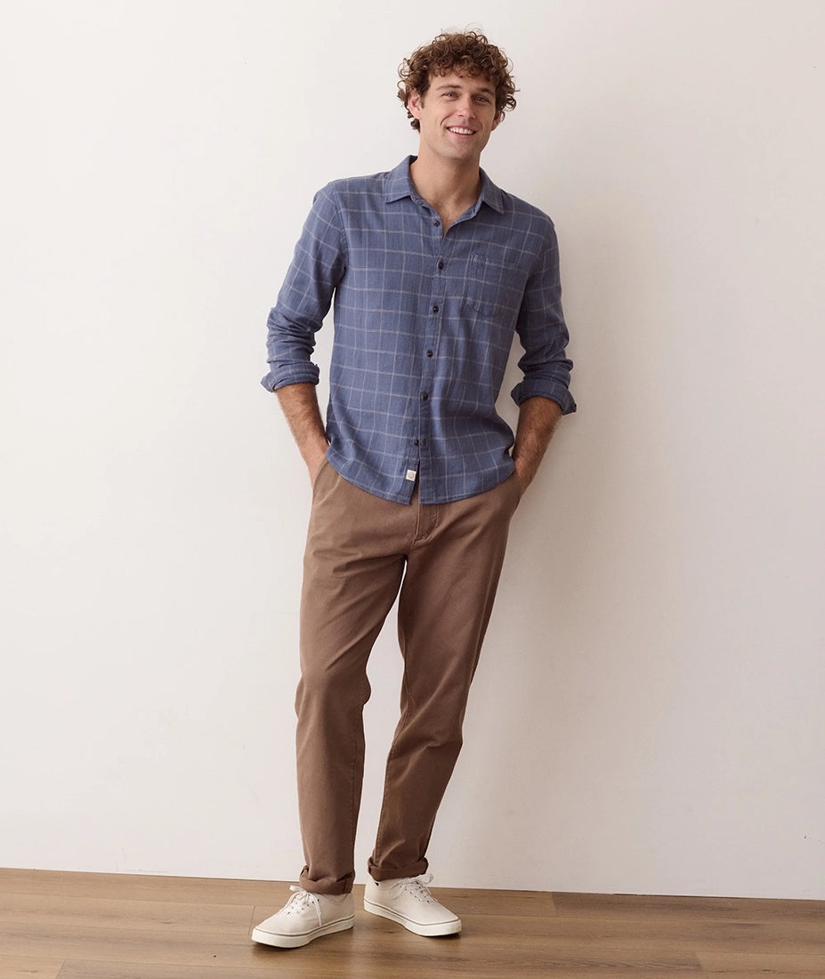 Man wearing Navy Windowpane stretch shirt with brown pants, full body front view - The Simple Man