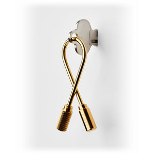 Brass Closed Helix Keyring hanging from a key - The Simple Man
