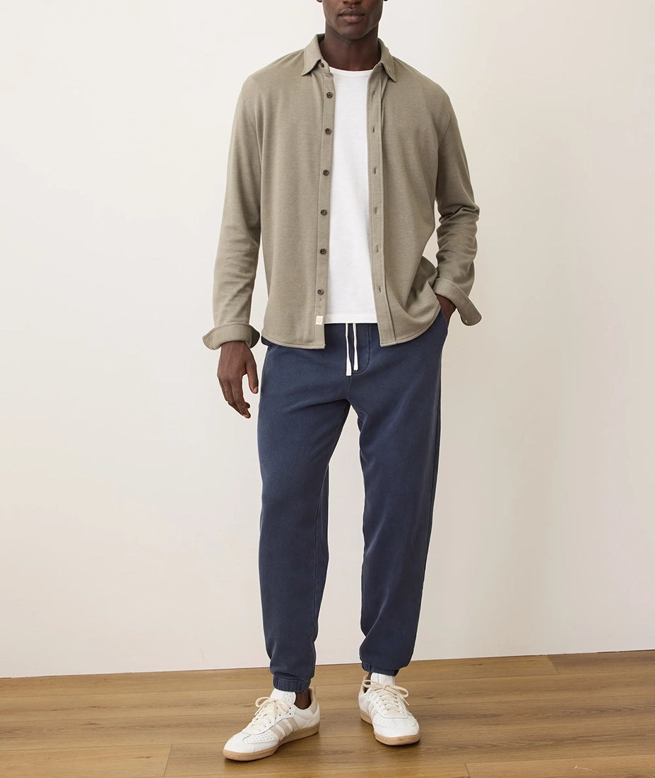 Men’s navy fleece sweatpants styled for everyday casual wear