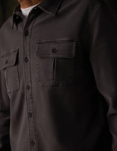 Detail shot of dual snap chest pockets on Comfort Terry Shirt Jacket in soft twill