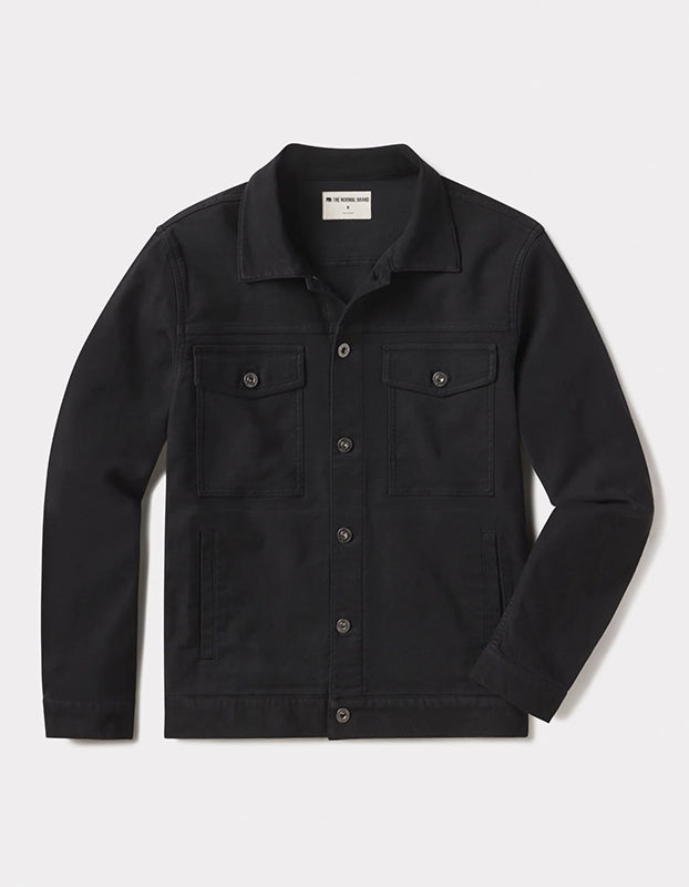 The Normal Brand Comfort Terry Trucker Jacket in black, flat lay view