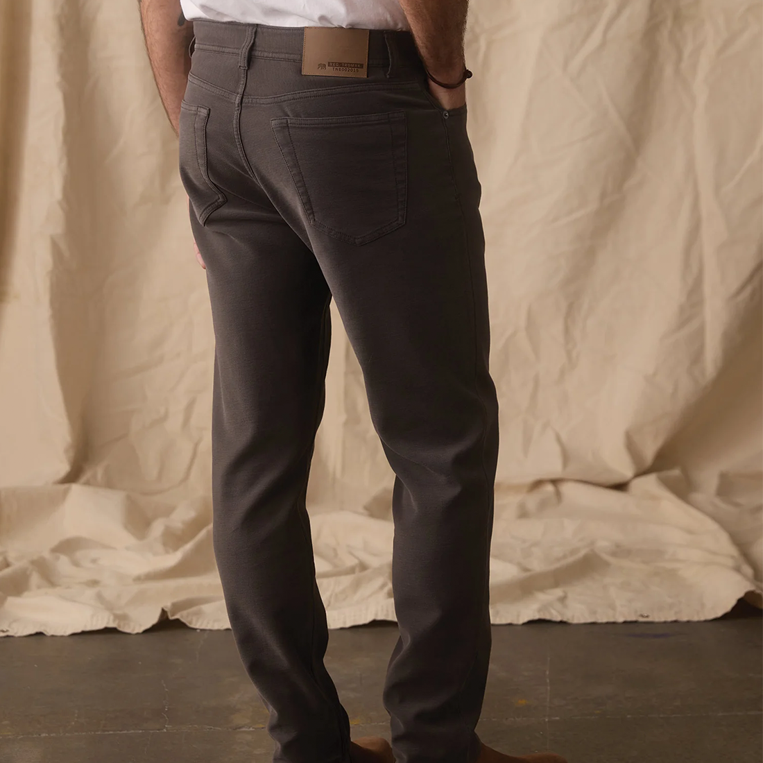 Comfort Terry Straight Pant in Steel, back view showing patch pockets and leather brand patch