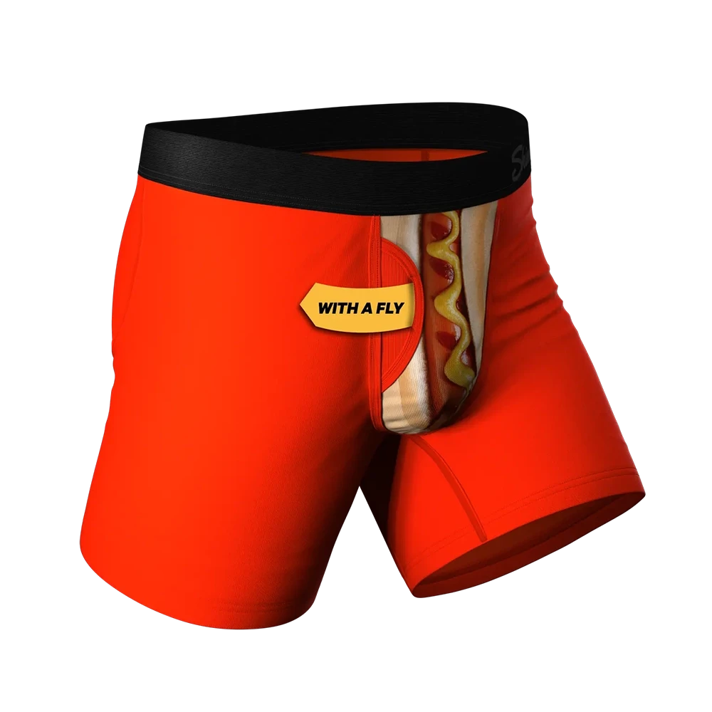 Side view of red Ball Hammock® underwear with fly, hot dog pouch design, novelty boxer briefs for men sold at The Simple Man.