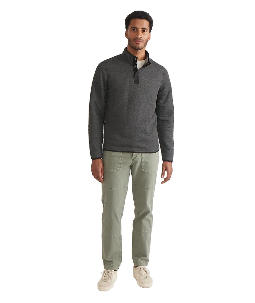 Full body shot of Marine Layer quilted Corbet Pullover in charcoal, styled with olive pants and sneakers