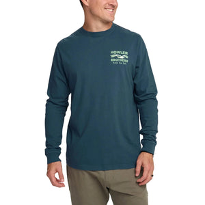 Front view of Howler Brothers Flocka Seagulls long sleeve cotton shirt in teal blue, soft screen print and regular fit shown on male model