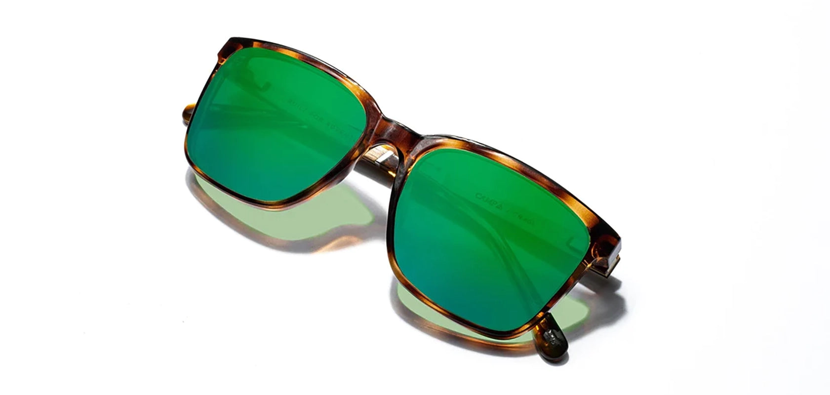 Camp Crag Sunglasses in Tortoise with walnut frames, HD + Green flash Polarized lenses, front angled closed temple view