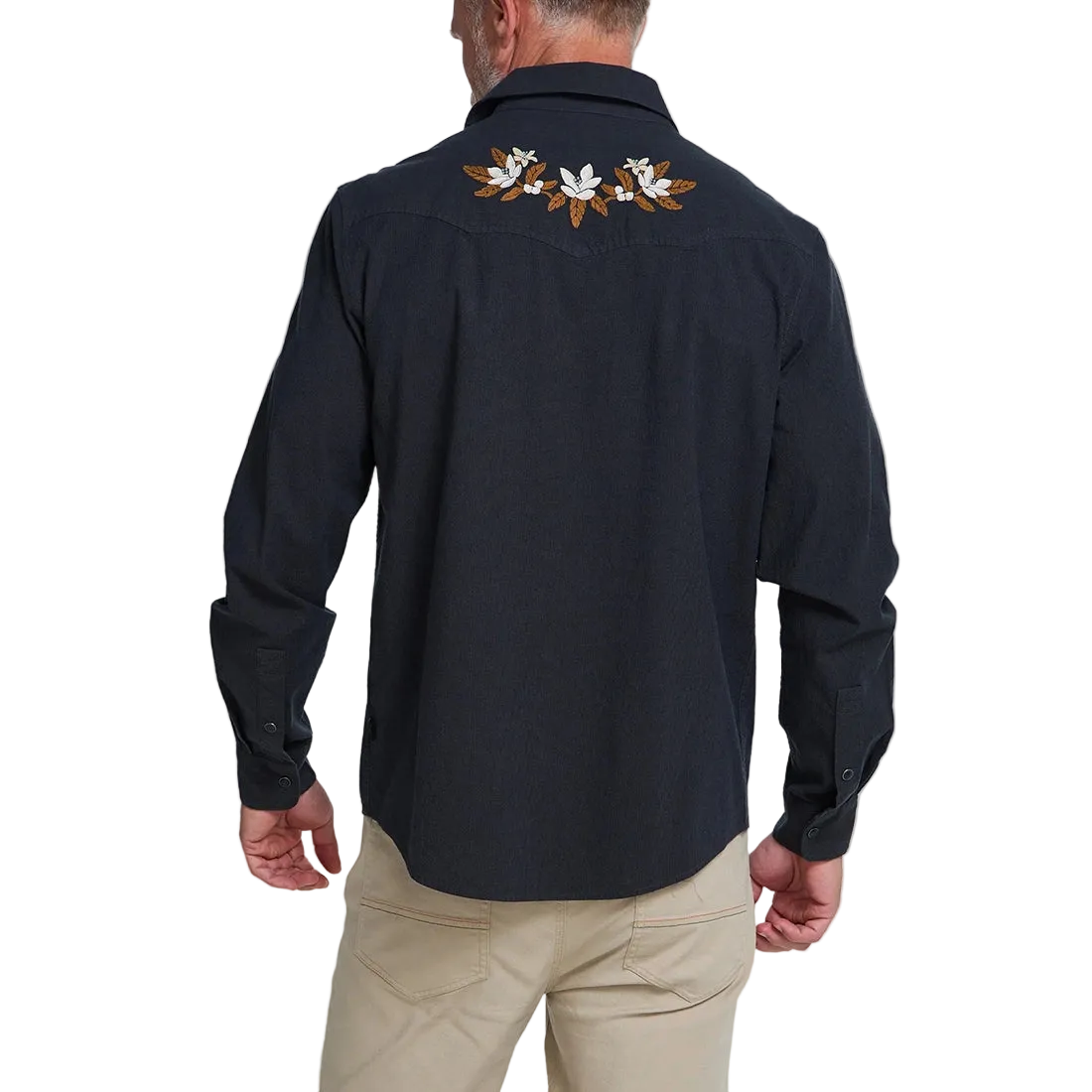 Back view of man wearing the black Orange Blossoms Crosscut Deluxe Longsleeve, embroidered floral yoke detail on western snap shirt -- The Simple Man