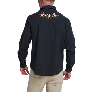 Back view of man wearing the black Orange Blossoms Crosscut Deluxe Longsleeve, embroidered floral yoke detail on western snap shirt -- The Simple Man