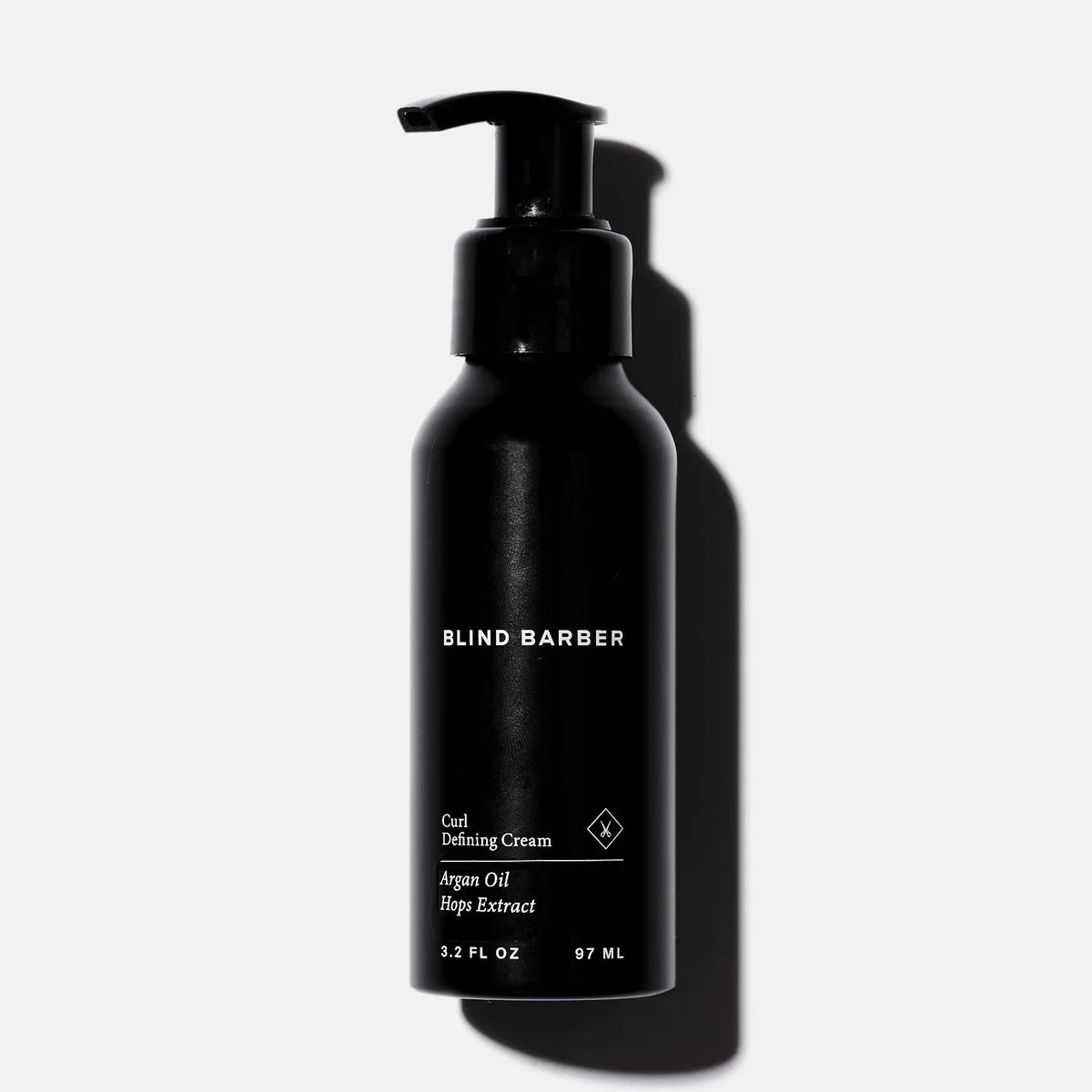 Blind Barber Curl Defining Cream pump bottle on white background, product flat lay - The Simple Man