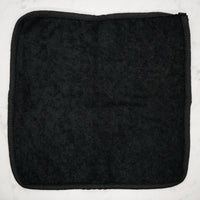 Soft black terry side of dual-sided face and body washcloth