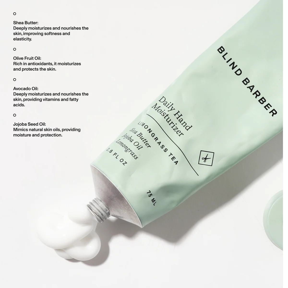 Blind Barber Daily Hand Moisturizer tube with cream, shea butter and jojoba seed oil detail, The Simple Man
