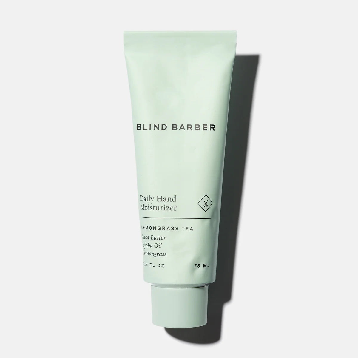 Blind Barber Daily Hand Moisturizer mint green tube, product shot, The Simple Man