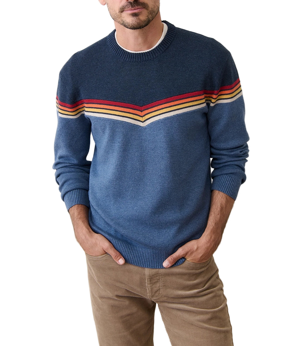 Model wearing Dean Crew Sweater navy with red and gold chevron stripe detail – organic cotton and recycled poly knit