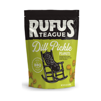 Green and black 9oz pouch of Dill Pickle peanuts with a pickle lounging in a rocking chair, front view
