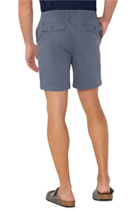 Model Wearing drawstring shorts in vintage indigo color, rear  view