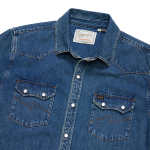 Howler Bros Dust Up Denim neck label and western collar on the Bolan Classic Wash snapshirt, detail view, The Simple Man