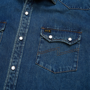 Lightning bolt stitching, pearl snap flap and H/B label on the Dust Up Denim Snapshirt pocket, detail view, The Simple Man