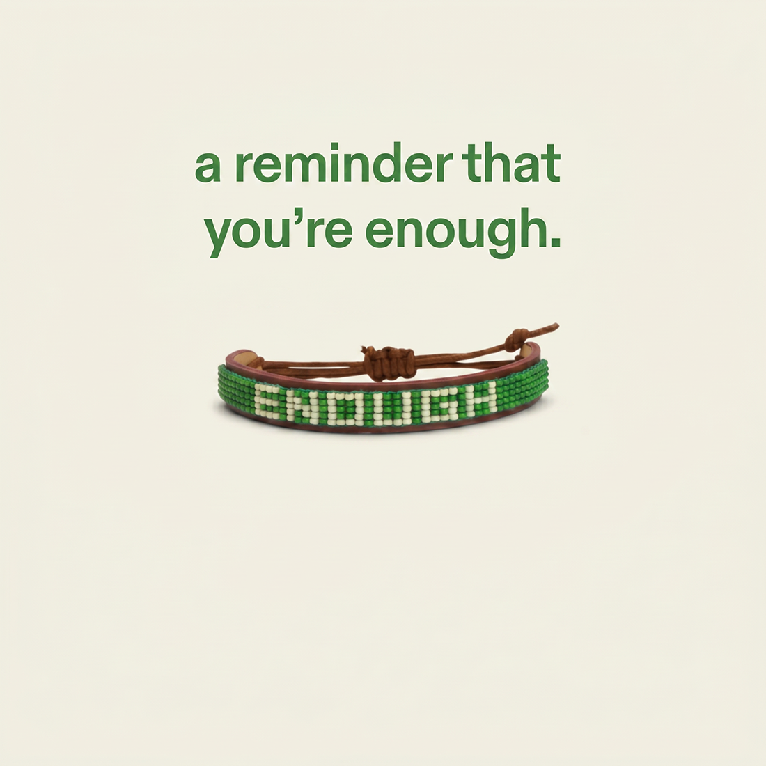 We Are Enough ENOUGH Beaded Leather Bracelet single worn on wrist showing adjustable sliding knot