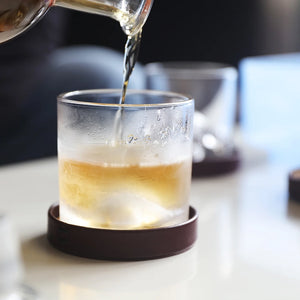 Whiskey being poured into a chilled LIITON Everest Crystal Glass, showcasing the fast-cooling design – lifestyle image from The Simple Man.